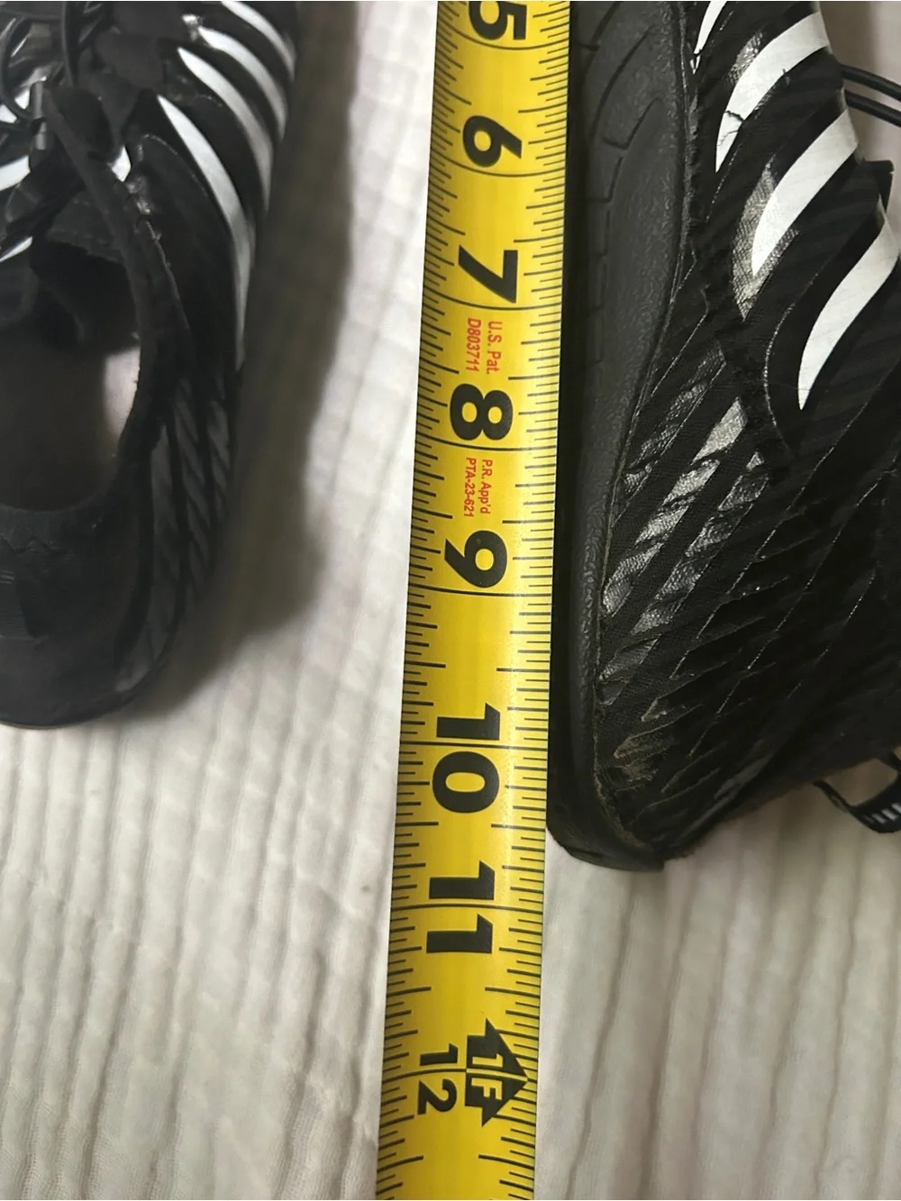 Black Barefoot Athletic-Style Shoes with White Stripes